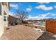 Brick patio, wood fence, and a spacious backyard at 10890 W Belmont Ave, Littleton, CO 80127