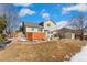 House exterior with patio and storage shed at 10890 W Belmont Ave, Littleton, CO 80127