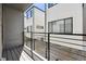 Relaxing balcony with metal railings and views of the modern exterior at 1563 N Hooker St, Denver, CO 80204