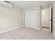 A bright bedroom features a closet and modern air conditioning unit at 1563 N Hooker St, Denver, CO 80204