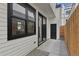 Outdoor patio area with sliding glass door access to the interior; features modern exterior finishes at 1563 N Hooker St, Denver, CO 80204