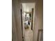A compact bathroom with essential fixtures including a pedestal sink, toilet, and tiled shower/tub combination at 1255 Yates St, Denver, CO 80204