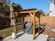 Covered patio with built-in grill and string lights at 15602 E Dorado Pl, Centennial, CO 80015