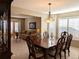 Formal dining room with a large table and chandelier at 15602 E Dorado Pl, Centennial, CO 80015