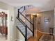 Elegant staircase leading to upper level at 15602 E Dorado Pl, Centennial, CO 80015