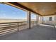 Covered patio with a scenic landscape view provides a great spot for outdoor living and relaxation at 8630 Pennycress Dr, Littleton, CO 80125