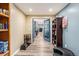 Open basement area with neutral walls, wood flooring, and open access to other rooms at 2835 S Jebel Way, Aurora, CO 80013