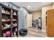 Finished basement area with neutral walls, wood flooring, and a closet for storage at 2835 S Jebel Way, Aurora, CO 80013