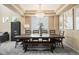 Elegant dining room featuring a modern chandelier and a large dining table at 2835 S Jebel Way, Aurora, CO 80013