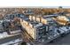 Aerial view of modern townhouses with mountain views at 1245 N Utica St # 103, Denver, CO 80204