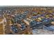 Aerial view of townhouses nestled in a residential area with mountain backdrop at 1245 N Utica St # 103, Denver, CO 80204