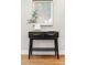 Modern entryway with black console table and decor at 1245 N Utica St # 103, Denver, CO 80204