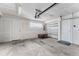 Spacious garage with overhead storage and ample space for parking at 1245 N Utica St # 103, Denver, CO 80204