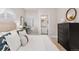 Bright bedroom with a queen-size bed and en-suite bath at 1245 N Utica St # 103, Denver, CO 80204