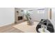 Finished basement living area features a stylish brick fireplace and cozy seating at 3035 E Maplewood Ave, Centennial, CO 80121