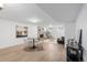 Finished basement with a dining area, living space, and modern decor at 3035 E Maplewood Ave, Centennial, CO 80121