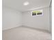 Finished basement bedroom with carpet flooring, natural light and white walls at 13010 W 6Th Pl, Golden, CO 80401