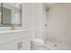 Stylish bathroom featuring a vanity with mirror and patterned tile shower at 13010 W 6Th Pl, Golden, CO 80401