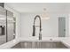 Modern kitchen boasts stainless steel appliances, undermount sink, and sleek countertop at 13010 W 6Th Pl, Golden, CO 80401