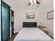 Bright bedroom with hardwood floors and a comfortable bed, perfect for relaxation at 962 S Dearborn Way # 19, Aurora, CO 80012
