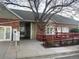 Brick building with a grey roof and an accessible ramp to the right of an arched window, with parking at 962 S Dearborn Way # 19, Aurora, CO 80012