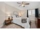 Inviting bedroom with natural light, plush carpet, and neutral decor at 6071 Russell Ln, Arvada, CO 80403