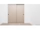 Bedroom closet featuring large, light, sliding doors and neutral carpet at 3433 Lawrence St # 1, Denver, CO 80205