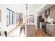 Bright kitchen features modern appliances, ample counter space, and a breakfast bar at 3433 Lawrence St # 1, Denver, CO 80205