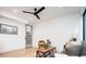 Living room featuring modern furniture, decor, ceiling fan and natural lighting at 3433 Lawrence St # 1, Denver, CO 80205