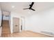 Open living area features wood floors, stairs to the second floor, and recessed lighting at 3433 Lawrence St # 1, Denver, CO 80205