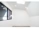 Bright room featuring a large window, neutral carpet, and recessed lighting at 3433 Lawrence St # 1, Denver, CO 80205