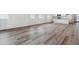 Spacious open-concept living area with wood flooring and bright natural light at 8241 Rockvale Dr, Littleton, CO 80125