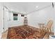 Basement area with brick walls and a carpeted floor with space for storage at 2339 Lowell Blvd, Denver, CO 80211
