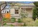 Charming bungalow with a well-maintained front yard and inviting facade at 2339 Lowell Blvd, Denver, CO 80211