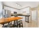 Bright kitchen featuring stainless steel appliances, and white cabinets at 2339 Lowell Blvd, Denver, CO 80211