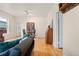 Open living area with hardwood floors and neutral color palette at 2339 Lowell Blvd, Denver, CO 80211
