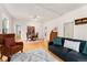 Spacious living room with hardwood floors and comfortable furniture arrangement at 2339 Lowell Blvd, Denver, CO 80211