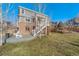 Two-story home with deck and backyard at 2202 Indian Paintbrush Way, Erie, CO 80516