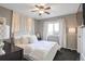 Charming bedroom with decorative headboard and window seating at 2715 Sunset Pl, Erie, CO 80516