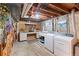 A basement laundry room with a utility sink, craft space, and lots of room for storage at 6532 S Ogden St, Centennial, CO 80121