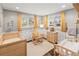 Bright Bedroom featuring two wooden cribs, a rocking chair, wood floors, and lots of natural light at 6532 S Ogden St, Centennial, CO 80121