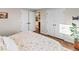 Another view of the bright main bedroom featuring hardwood floors and lots of closet space at 6532 S Ogden St, Centennial, CO 80121