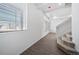 Bright entryway with stairs leading upstairs and a view of a window at 16142 E 111Th Dr, Commerce City, CO 80022