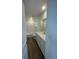 Modern bathroom with hardwood floors, a tub and shower, and a vanity with quartz countertop at 22057 E 39Th Pl, Aurora, CO 80019