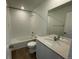 Modern bathroom with white subway tiles, a large vanity, and a shower-tub combination at 22057 E 39Th Pl, Aurora, CO 80019