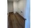 Practical laundry room with wood-look tile flooring and washer/dryer hookups at 22057 E 39Th Pl, Aurora, CO 80019