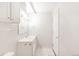 Clean bathroom featuring a vanity, toilet and tiled floor at 70 W 6Th Ave # 109, Denver, CO 80204