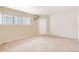 Bright bedroom with neutral walls and carpeting, and window at 70 W 6Th Ave # 109, Denver, CO 80204