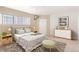 Comfortable bedroom with carpet flooring, a neutral color scheme, and a cozy atmosphere at 70 W 6Th Ave # 109, Denver, CO 80204