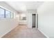 Spacious bedroom with carpet, neutral walls, and a large closet at 70 W 6Th Ave # 109, Denver, CO 80204